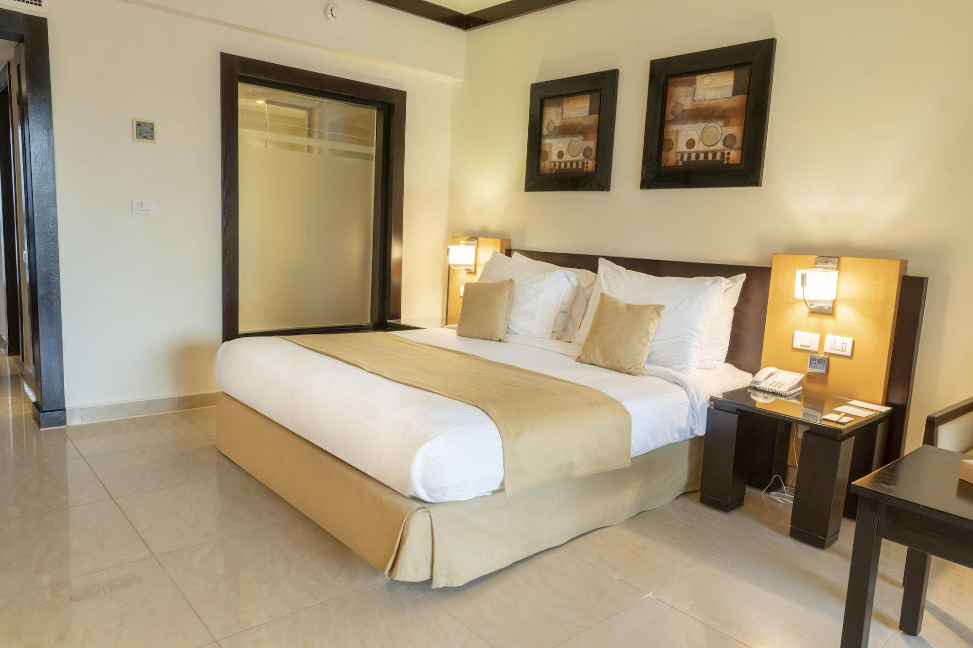 Sunrise Montemare Resort -Grand Select (Adults Only) Sharm el-Sheikh Luaran gambar A bedroom at the hotel